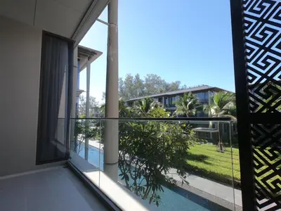a view from the balcony of a house at Baan Mai Khao condo in Mai Khao Beach