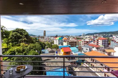 a view of a city from a balcony at Wazza's Patong Apartment, Smart TV and Fast Wi-Fi in Patong Beach