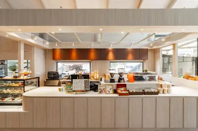 a bakery with a counter in the middle of a room at Katathani Phuket Beach Resort - SHA Extra Plus in Kata Beach