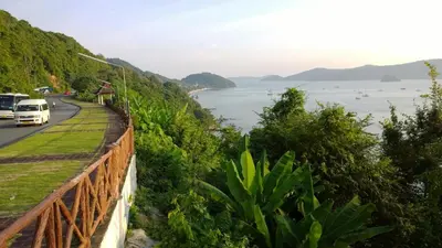 a view of the ocean from a hill at U Sabai Living Hotel in Patong Beach