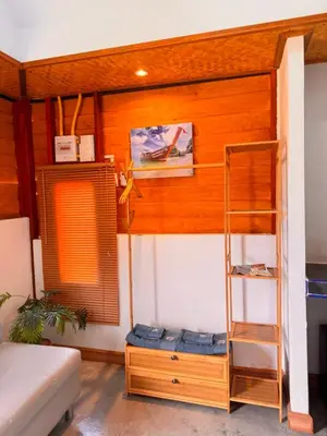 a bedroom with a bunk bed with a ladder at Resting Place Ko Yao Yai in Ko Yao Yai