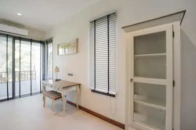 a home office with a desk and a window at Villa Palavee (A2) in Ao Nang Beach