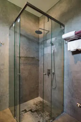 a shower with a glass enclosure in a bathroom at Villa Palavee (A2) in Ao Nang Beach