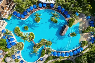 an overhead view of a swimming pool at a resort at Phuket Marriott Resort & Spa, Merlin Beach in Patong Beach
