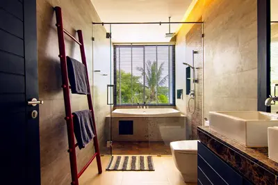 a bathroom with a sink toilet and a tub at Amazing 5br, Seaview private PoolVilla by Intira Villas in Rawai Beach