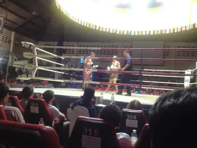 a group of people watching a boxing match at Baan Thai Beach Side Residence, Patong Beach in Patong Beach