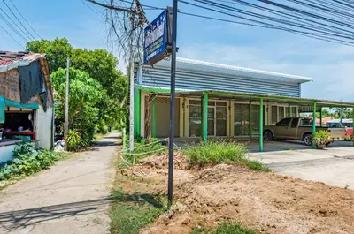 a store on the side of a street at RAT VILLA in Ban Pa Khlok