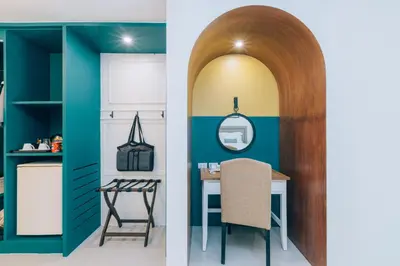 a kitchen and a dining room with a table at Sugar Marina Hotel - NAUTICAL - Kata Beach in Kata Beach