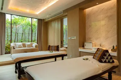 a hospital room with two beds and a window at InterContinental Phuket Resort by IHG in Kamala Beach