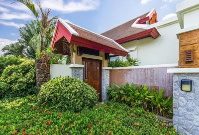 a house with a red roof at VILLA TOGIAN Private Pool Naiharn beach in Rawai Beach