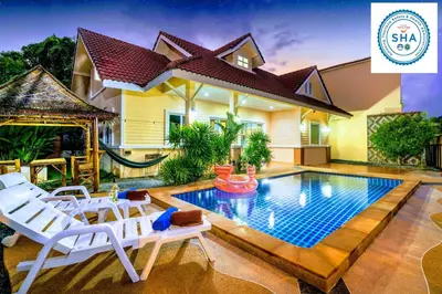 a house with a swimming pool in the backyard at Relax private Pool Villas - 4 bedroom villas in Ao Nang Beach