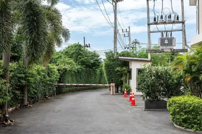 an empty street with orange cones in front of a building at VILLA Bangka 4BR Private pool villa Rawai in Rawai Beach