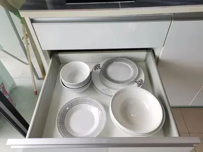 a group of plates and bowls in a drawer at 4 Floor - Centrio Condominium in Phuket town in Phuket Town