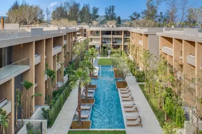 an aerial view of the courtyard of an apartment building with a swimming pool at Twinpalms MontAzure Phuket in Kamala Beach