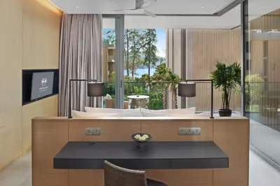 a bathroom with a large tub in a room at Twinpalms MontAzure Phuket in Kamala Beach
