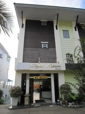 a building with a sign that reads emerald kitchen at Royal Nakara Ao Nang in Ao Nang Beach