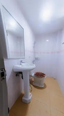 a bathroom with a sink and a toilet at Silla Patong Boutique - Beach Walk Access in Patong Beach