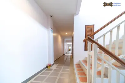 a hallway with stairs in a house at Ming Shou Boutique House in Phuket Town