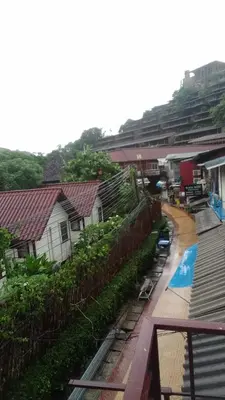 a view of a village with houses and a street at Sabai House in Phi Phi Don