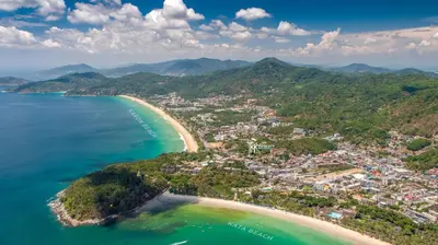 an aerial view of a beach and the ocean at KK Karon Kata Boutique Hotel in Kata Beach