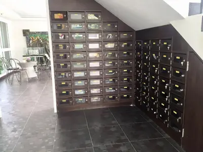 a wine cellar with a wall of wine cabinets at Aonang Ocean View Studio ( The Sea Condo ) in Ao Nang Beach