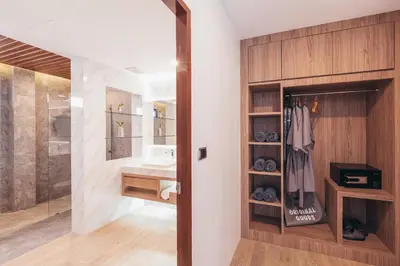 a bathroom with a walk in shower and a sink at Poonsiri Varich Pool Villa Aonang in Ao Nang Beach