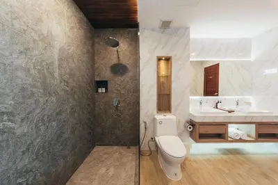 a bathroom with a toilet and a sink at Poonsiri Varich Pool Villa Aonang in Ao Nang Beach