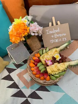 a basket of fruits and vegetables on a table at Phi Phi Maiyada Resort in Phi Phi Don
