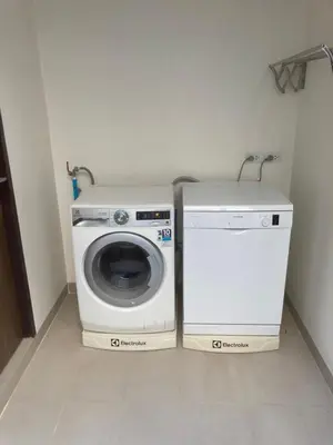 a washing machine and a washer in a room at 5bdr Pool Villa In Laguna Park #40 by Capital Pro in Bang Tao Beach