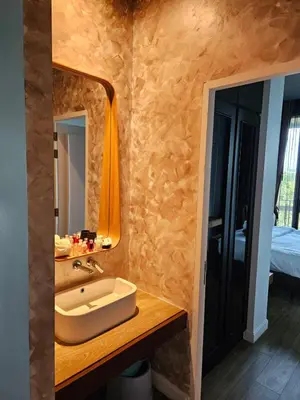 a bathroom with a sink and a mirror at Lucky Holidays in Saturdays Residence in Rawai Beach