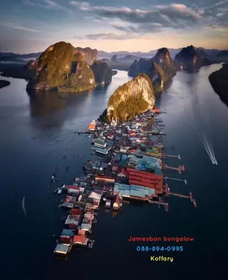 an aerial view of a group of ships in a harbor at Jamesbond Bungalow Koh Panyee in Ko Panyi