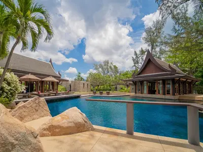 a swimming pool with a gazebo and a house at Villa Chada in Kamala Beach