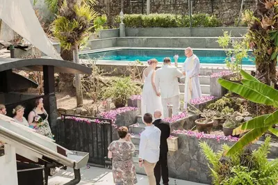a group of people standing in front of a pool at Baan Heaven / Patong Beach Pool Villa Sleeps up to 15 in Patong Beach
