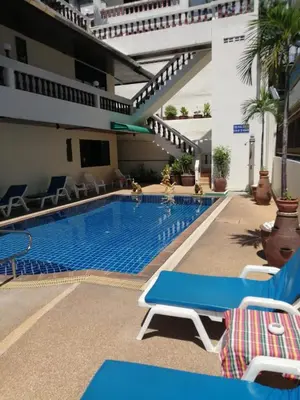 a swimming pool in the middle of a hotel at Blue Sky Residence in Patong Beach