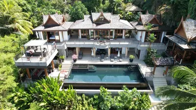 an aerial view of a house with a swimming pool at Luxury 4 bedrooms Villa with Seaview Infinity Pool overlooking Surin Beach in Surin Beach