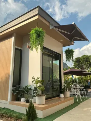 a small house with plants in front of it at Loma Place in Ao Nang Beach