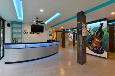 a lobby with a bar with a sign that says can therapy work at T2 Ao Nang Krabi in Ao Nang Beach