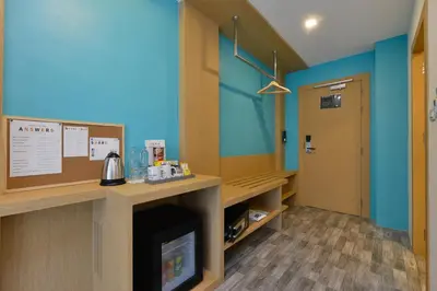 a room with a fireplace in a hospital room at T2 Ao Nang Krabi in Ao Nang Beach