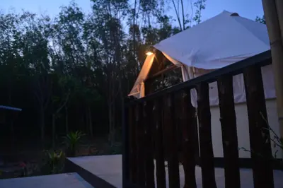 a gazebo on a porch at night at Camp Hadee Koh Yao Noi in Ko Yao Noi