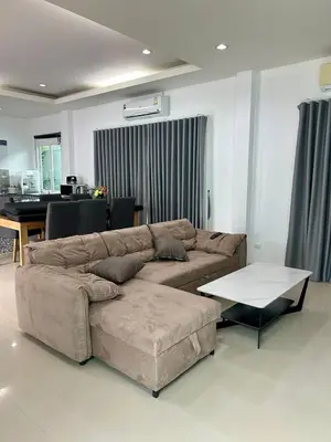 a living room with a couch and a table at Bests Villa - Rawai Beach Phuket in Rawai Beach