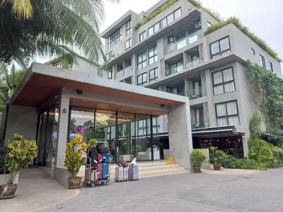 a building with a store in front of it at Amazing Apartment in Diamond Condominium, Bang Tao Beach in Bang Tao Beach