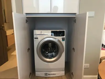 a washer and dryer in a small room at Amazing Apartment in Diamond Condominium, Bang Tao Beach in Bang Tao Beach