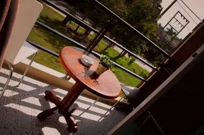 a skateboard sitting on a table on a balcony at Tropical Sands in Nai Harn Beach