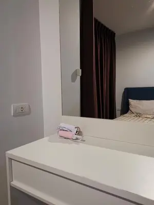 a bathroom with a mirror and a white counter top at 2 Floor - Centrio Condominium near Central Shopping Mall and Phuket Old town in Phuket Town