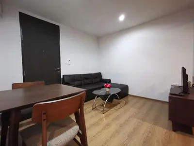 a living room with a couch and a table at 2 Floor - Centrio Condominium near Central Shopping Mall and Phuket Old town in Phuket Town