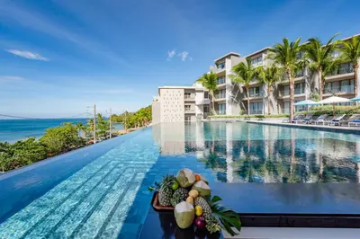 a view of the infinity pool at the resort at Oceanfront Beach Resort in Patong Beach