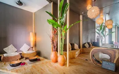 a room with a table with vases on top of it at Icon Park Apartments - Kamala Beach in Kamala Beach