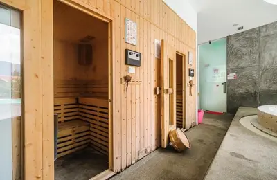 a room with an open door to a room with at Icon Park Apartments - Kamala Beach in Kamala Beach
