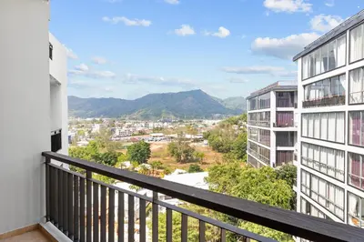 a balcony with a view of a city at Icon Park Apartments - Kamala Beach in Kamala Beach
