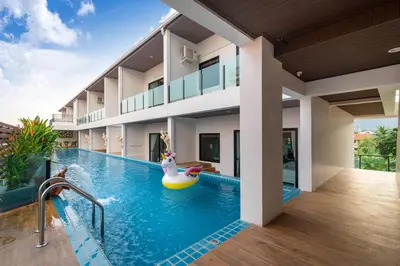 a swimming pool in a house with a pool toy at The Thames Pool Access Resort & Villa - SHA Extra Plus in Chalong